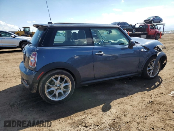 2011 MINI Hardtop S with VIN WMWSV3C57BTY13899, listed as a Copart auction lot 55802555 with 73,012 mi miles and Salvage title. Bid and sale history available at DreamBid. Image 3.