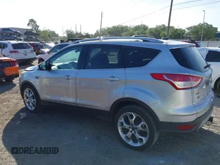 2016 Ford Escape Titanium with VIN 1FMCU0J94GUB11776, listed as a IAAI auction lot 41945655 with 119,949 mi miles. Bid and sale history available at carsss.com. Image 14.