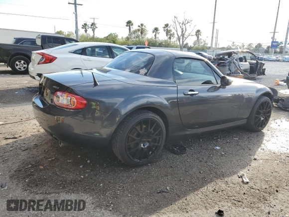 2015 Mazda MX-5 Miata Grand Touring z VIN JM1NC2PF3F0239991, wystawiony jako Copart lot #46989165 z przebiegiem 139 801 mil mil oraz Szkoda całkowita • Salvage title. Historia ofert i sprzedaży dostępna na DreamBid. Obrazek 3.