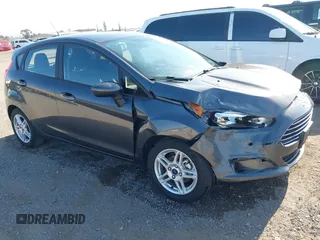 2019 Ford Fiesta SE z VIN 3FADP4EJ5KM118881, wystawiony jako IAAI lot #42303485 z przebiegiem 35 616 mil mil oraz . Historia ofert i sprzedaży dostępna na DreamBid. Obrazek 1.