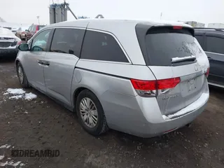 2014 Honda Odyssey LX with VIN 5FNRL5H22EB080346, listed as a IAAI auction lot 41282783 with 101,000 mi miles and . Bid and sale history available at carsss.com. Image 3.