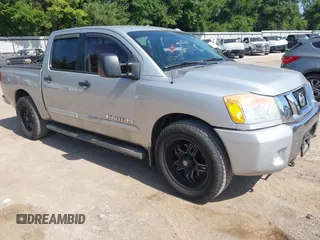 2012 Nissan Titan SV with VIN 1N6BA0ED8CN320723, listed as a IAAI auction lot 42642482 with 214,941 mi miles and . Bid and sale history available at DreamBid. Image 1.
