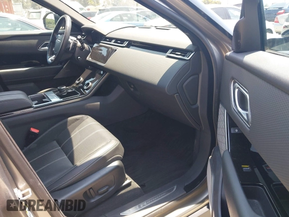 2019 Land Rover Range Rover Velar R-Dynamic SE z VIN SALYL2EX8KA784025, wystawiony jako IAAI lot #42786648 z przebiegiem 75 780 mil mil oraz . Historia ofert i sprzedaży dostępna na DreamBid. Obrazek 5.
