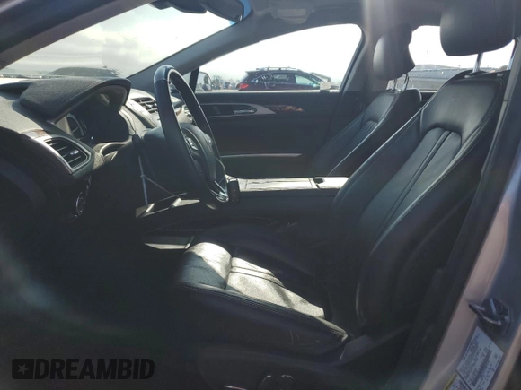 2014 Lincoln MKZ Hybrid z VIN 3LN6L2LU7ER821918, wystawiony jako Copart lot #60754555 z przebiegiem 128 295 mil mil oraz Szkoda całkowita • Salvage title. Historia ofert i sprzedaży dostępna na DreamBid. Obrazek 7.