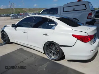 2014 Infiniti Q50 Premium with VIN JN1BV7AP4EM672032, listed as a IAAI auction lot 42339388 with 203,841 mi miles and . Bid and sale history available at DreamBid. Image 14.