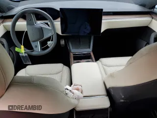 2023 Tesla Model S with VIN 5YJSA1E58PF498685, listed as a Copart auction lot 41690475 with Not provided miles and Salvage title. Bid and sale history available at DreamBid. Image 8.