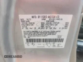 2012 Ford Escape XLS z VIN 1FMCU0C79CKC84677, wystawiony jako Copart lot #64234045 z przebiegiem 138 562 mil mil oraz Czysty tytuł • Clean title. Historia ofert i sprzedaży dostępna na DreamBid. Obrazek 13.