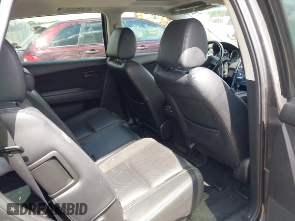 2015 Mazda CX-9 Touring with VIN JM3TB2CA7F0460232, listed as a IAAI auction lot 42344122 with 103,478 mi miles and . Bid and sale history available at DreamBid. Image 8.