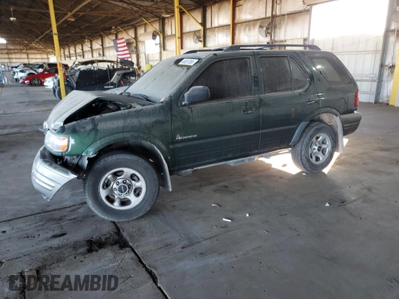 2002 Isuzu Rodeo z VIN 4S2CK58DX24320793, wystawiony jako Copart lot #46357065 z przebiegiem 180 306 mil mil oraz Szkody całkowita. Historia ofert i sprzedaży dostępna na DreamBid. Obrazek 1.