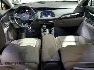 2021 Cadillac XT4 AWD Luxury with VIN 1GYFZBR42MF055788, listed as a Copart auction lot 46704275 with 23,516 mi miles and Clean Title. Bid and sale history available at carsss.com. Image 8.