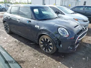 2016 MINI Hardtop 4 Door S z VIN WMWXU3C50G2B67548, wystawiony jako IAAI lot #42182996 z przebiegiem 78 985 mil mil oraz . Historia ofert i sprzedaży dostępna na DreamBid. Obrazek 1.