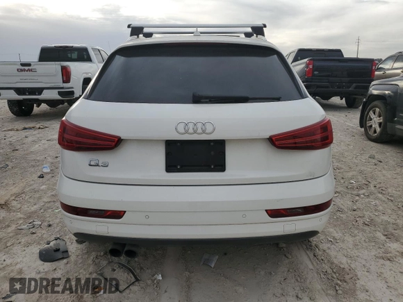2017 Audi Q3 Premium z VIN WA1BCCFS0HR016968, wystawiony jako Copart lot #79358604 z przebiegiem Nie podano mil oraz Szkody całkowita. Historia ofert i sprzedaży dostępna na DreamBid. Obrazek 6.