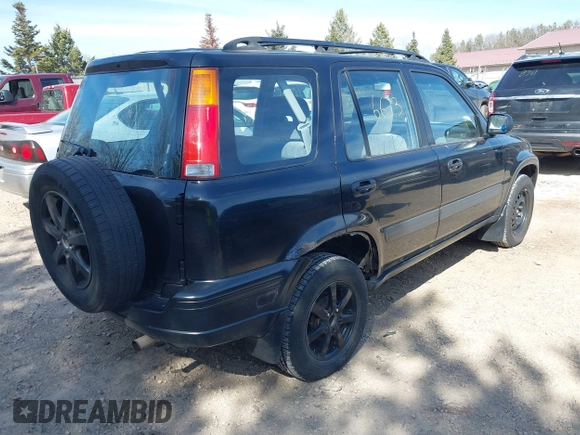1998 Honda CR-V LX z VIN JHLRD1740WC076533, wystawiony jako IAAI lot #42046673 z przebiegiem 201 946 mil mil oraz . Historia ofert i sprzedaży dostępna na DreamBid. Obrazek 4.