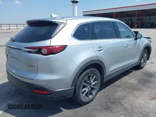 2020 Mazda CX-9 Touring with VIN JM3TCBCY2L0415513, listed as a IAAI auction lot 42481543 with 47,294 mi miles and . Bid and sale history available at DreamBid. Image 4.