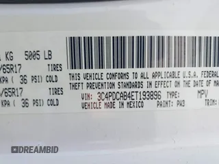 2014 Dodge Journey SE with VIN 3C4PDCAB4ET193896, listed as a IAAI auction lot 42126565 with 242,108 mi miles and . Bid and sale history available at carsss.com. Image 9.