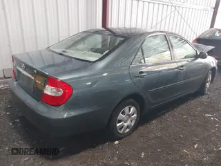 2004 Toyota Camry LE with VIN 4T1BE30K54U377818, listed as a IAAI auction lot 41931027 with 212,690 mi miles. Bid and sale history available at carsss.com. Image 4.