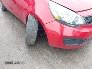 2014 Kia Rio LX with VIN KNADM4A36E6417050, listed as a IAAI auction lot 42005888 with 129,433 mi miles. Bid and sale history available at carsss.com. Image 6.
