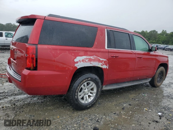 2015 Chevrolet Suburban LT with VIN 1GNSCJKC2FR306223, listed as a Copart auction lot 58733475 with 191,330 mi miles and Salvage title. Bid and sale history available at DreamBid. Image 3.