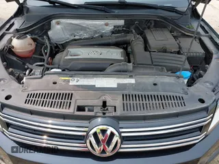 2013 Volkswagen Tiguan S with VIN WVGAV3AX2DW594334, listed as a IAAI auction lot 42405989 with 96,559 mi miles and . Bid and sale history available at DreamBid. Image 10.