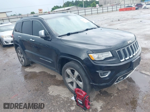 2015 Jeep Grand Cherokee Overland with VIN 1C4RJECG1FC769950, listed as a IAAI auction lot 42405712 with 217,514 mi miles and . Bid and sale history available at DreamBid. Image 1.