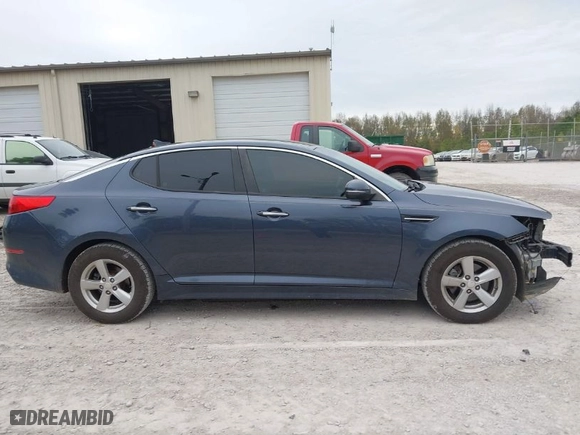 2015 Kia Optima LX with VIN 5XXGM4A79FG441283, listed as a IAAI auction lot 40834778 with 210,110 mi miles. Bid and sale history available at carsss.com. Image 14.
