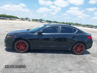 2013 Acura ILX Technology z VIN 19VDE1F72DE014291, wystawiony jako IAAI lot #42221550 z przebiegiem 134 825 mil mil oraz . Historia ofert i sprzedaży dostępna na DreamBid. Obrazek 15.