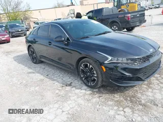 2021 Kia K5 GT-Line z VIN 5XXG64J24MG022821, wystawiony jako IAAI lot #41970102 z przebiegiem 67 105 mil mil oraz . Historia ofert i sprzedaży dostępna na DreamBid. Obrazek 1.