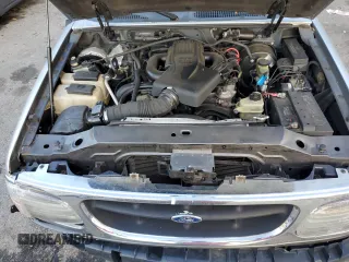 1999 Ford Explorer XLT z VIN 1FMZU32E4XUA16402, wystawiony jako Copart lot #85243074 z przebiegiem 148 110 mil mil oraz Szkoda całkowita • Salvage title. Historia ofert i sprzedaży dostępna na DreamBid. Obrazek 12.