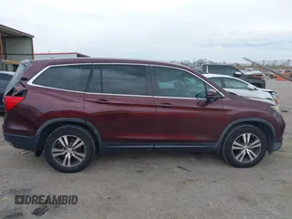 2016 Honda Pilot EX-L with VIN 5FNYF5H58GB026209, listed as a IAAI auction lot 41333088 with 129,484 mi miles and . Bid and sale history available at DreamBid. Image 13.