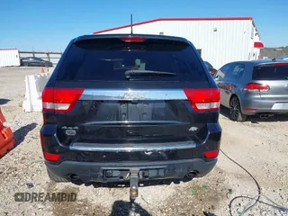 2013 Jeep Grand Cherokee Overland with VIN 1C4RJFCT1DC654653, listed as a IAAI auction lot 41826619 with 124,283 mi miles. Bid and sale history available at carsss.com. Image 17.