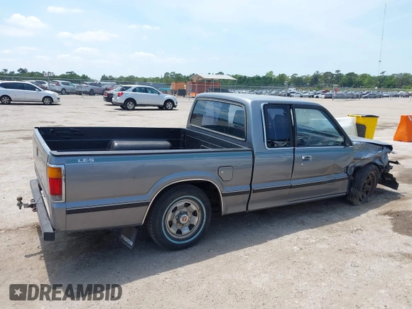 1992 Mazda B-Series Truck with VIN JM2UF313XN0306779, listed as a IAAI auction lot 42104583 with 137,826 mi miles and . Bid and sale history available at DreamBid. Image 13.