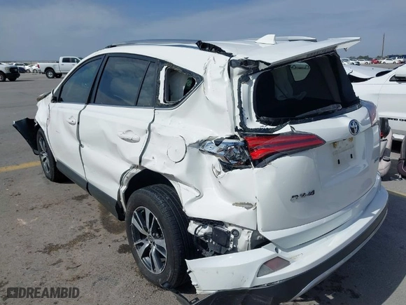 2018 Toyota RAV4 XLE with VIN JTMWFREV0JD132042, listed as a IAAI auction lot 41578567 with 102,365 mi miles. Bid and sale history available at carsss.com. Image 3.