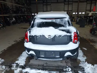 2014 MINI Countryman S with VIN WMWZC5C57EWP39161, listed as a IAAI auction lot 41342912 with 108,459 mi miles and . Bid and sale history available at DreamBid. Image 16.