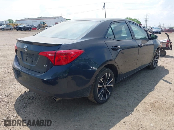 2018 Toyota Corolla L with VIN 2T1BURHE1JC111066, listed as a IAAI auction lot 42215074 with 106,677 mi miles and . Bid and sale history available at DreamBid. Image 4.