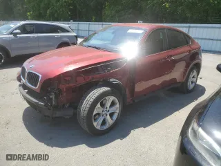 2014 BMW X6 xDrive35i with VIN 5UXFG2C50E0H10887, listed as a Copart auction lot 59720394 with 157,004 mi miles and Salvage Title. Bid and sale history available at carsss.com. Image 1.