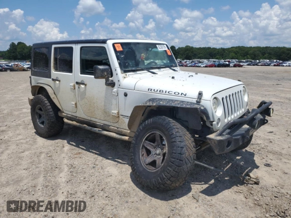 2015 Jeep Wrangler Unlimited Rubicon with VIN 1C4BJWFG6FL710993, listed as a Copart auction lot 62308195 with 103,938 mi miles and Salvage title. Bid and sale history available at DreamBid. Image 4.