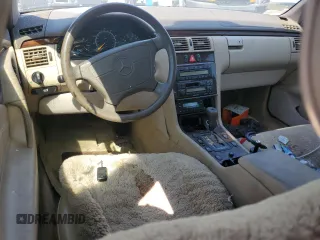 1997 Mercedes-Benz E-Class with VIN WDBJF72F2VA274233, listed as a Copart auction lot 74123554 with 80,914 mi miles and Salvage Title. Bid and sale history available at carsss.com. Image 8.