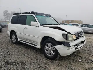 2004 Lexus LX 470 with VIN JTJHT00W343547828, listed as a Copart auction lot 48982045 with 196,877 mi miles and Salvage Title. Bid and sale history available at DreamBid. Image 4.