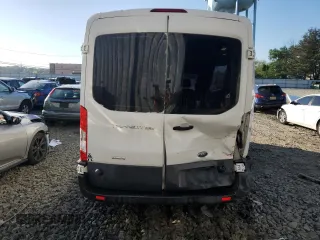 2015 Ford Transit Cargo with VIN 1FTNR2CG1FKA07097, listed as a Copart auction lot 61985765 with 74,100 mi miles and Salvage title. Bid and sale history available at DreamBid. Image 6.