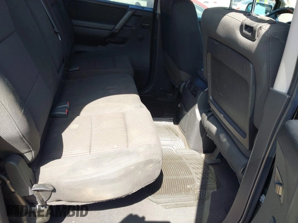 2008 Nissan Titan SE z VIN 1N6BA07D08N313205, wystawiony jako IAAI lot #42790513 z przebiegiem 154 131 mil mil oraz . Historia ofert i sprzedaży dostępna na DreamBid. Obrazek 8.