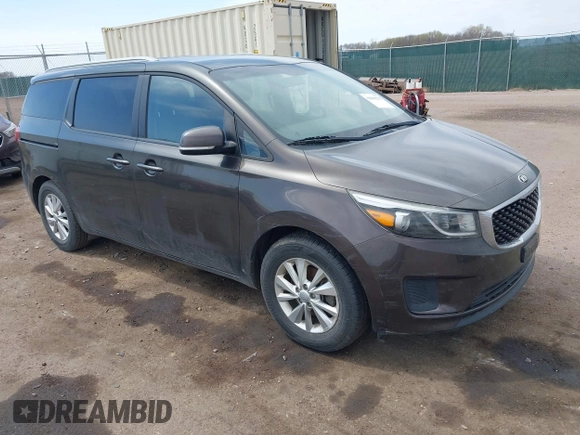 2015 Kia Sedona LX with VIN KNDMB5C13F6072586, listed as a IAAI auction lot 42090232 with 125,818 mi miles. Bid and sale history available at carsss.com. Image 1.