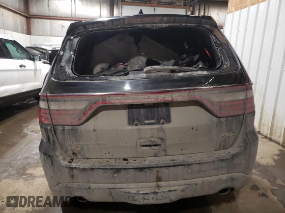 2014 Dodge Durango R/T with VIN 1C4SDJCT9EC977300, listed as a Copart auction lot 49930435 with 165,569 mi miles and Salvage title. Bid and sale history available at DreamBid. Image 6.
