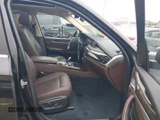2014 BMW X5 xDrive35i z VIN 5UXKR0C58E0H26011, wystawiony jako IAAI lot #42147773 z przebiegiem 131 173 mil mil oraz . Historia ofert i sprzedaży dostępna na DreamBid. Obrazek 5.