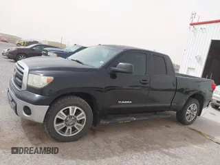 2013 Toyota Tundra z VIN 5TFRM5F19DX063197, wystawiony jako IAAI lot #41799886 z przebiegiem 351 859 mil mil oraz . Historia ofert i sprzedaży dostępna na DreamBid. Obrazek 14.
