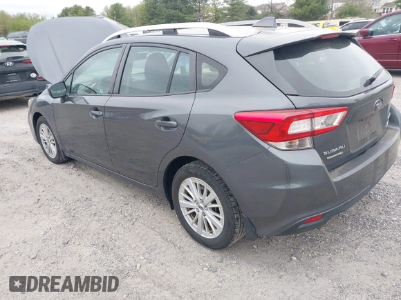 2018 Subaru Impreza Premium z VIN 4S3GTAD61J3703780, wystawiony jako IAAI lot #42081604 z przebiegiem 79 757 mil mil oraz . Historia ofert i sprzedaży dostępna na DreamBid. Obrazek 3.