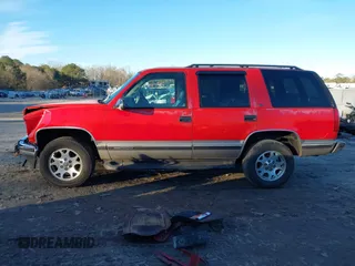 1999 GMC Yukon with VIN 1GKEK13R9XJ748190, listed as a IAAI auction lot 41317890 with 330,490 mi miles. Bid and sale history available at carsss.com. Image 15.