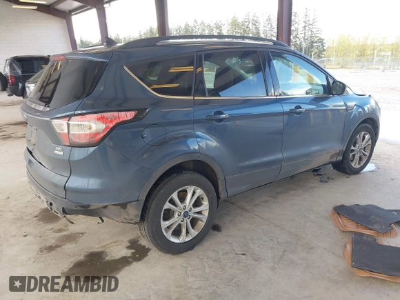 2018 Ford Escape SEL with VIN 1FMCU0HD1JUC04403, listed as a IAAI auction lot 41993351 with 91,880 mi miles and . Bid and sale history available at carsss.com. Image 4.