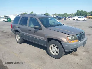 2001 Jeep Grand Cherokee Laredo z VIN 1J4GW48S81C694537, wystawiony jako IAAI lot #42447828 z przebiegiem 162 981 mil mil oraz . Historia ofert i sprzedaży dostępna na DreamBid. Obrazek 1.