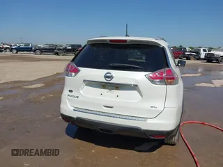 2016 Nissan Rogue SV with VIN KNMAT2MT1GP686630, listed as a IAAI auction lot 42000985 with 131,058 mi miles. Bid and sale history available at carsss.com. Image 16.