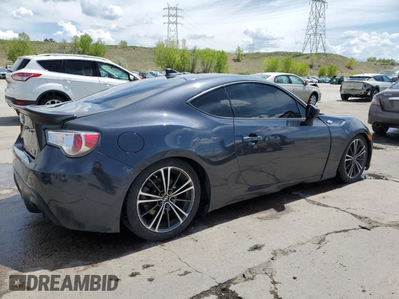 2015 Scion FR-S z VIN JF1ZNAA12F8707784, wystawiony jako Copart lot #56248735 z przebiegiem 119 679 mil mil oraz Szkoda całkowita • Salvage title. Historia ofert i sprzedaży dostępna na DreamBid. Obrazek 3.